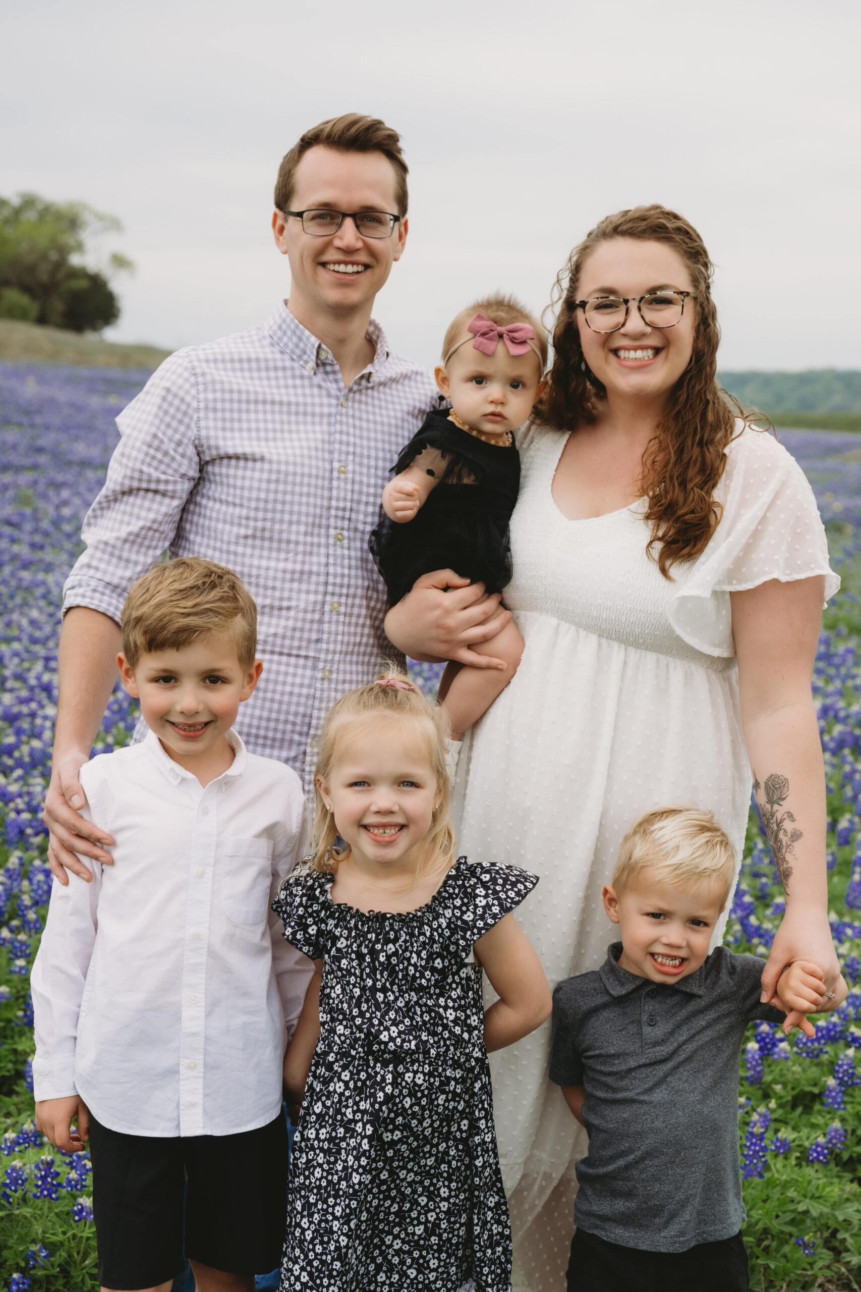 family of five in the bluebonnets at Muleshoe Bend recreation area