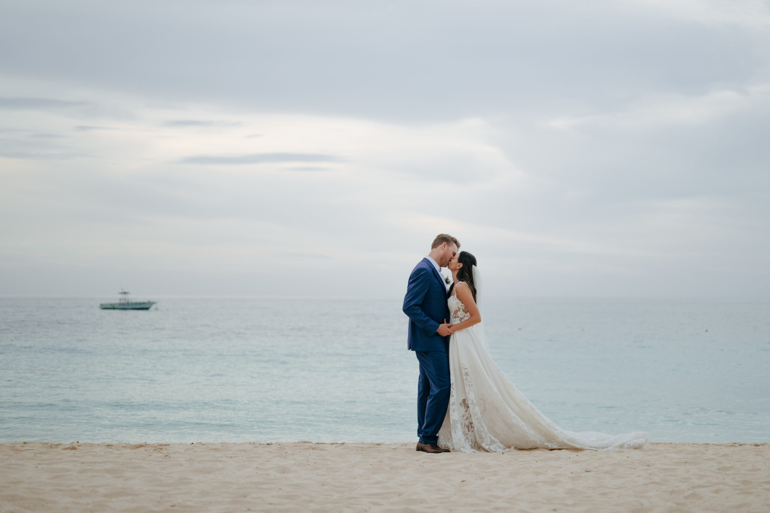 couple kissing on Punta Cana beach in Dominican Republic